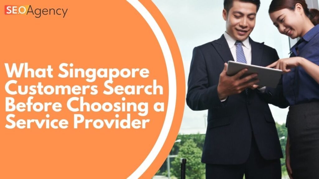 Photo of two colleagues talking, discussing Singapore customer search behaviour